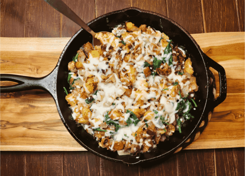 German potato skillet recipe completed with melted cheese on top