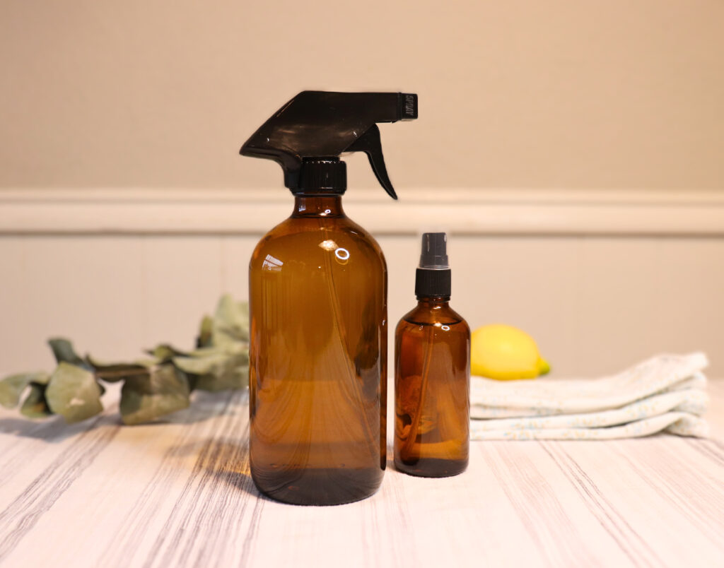 Homemade natural cleaning solutions with lemon and eucalyptus