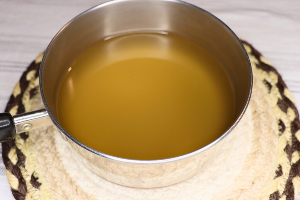 brine for spicy pickled onions in a small pot