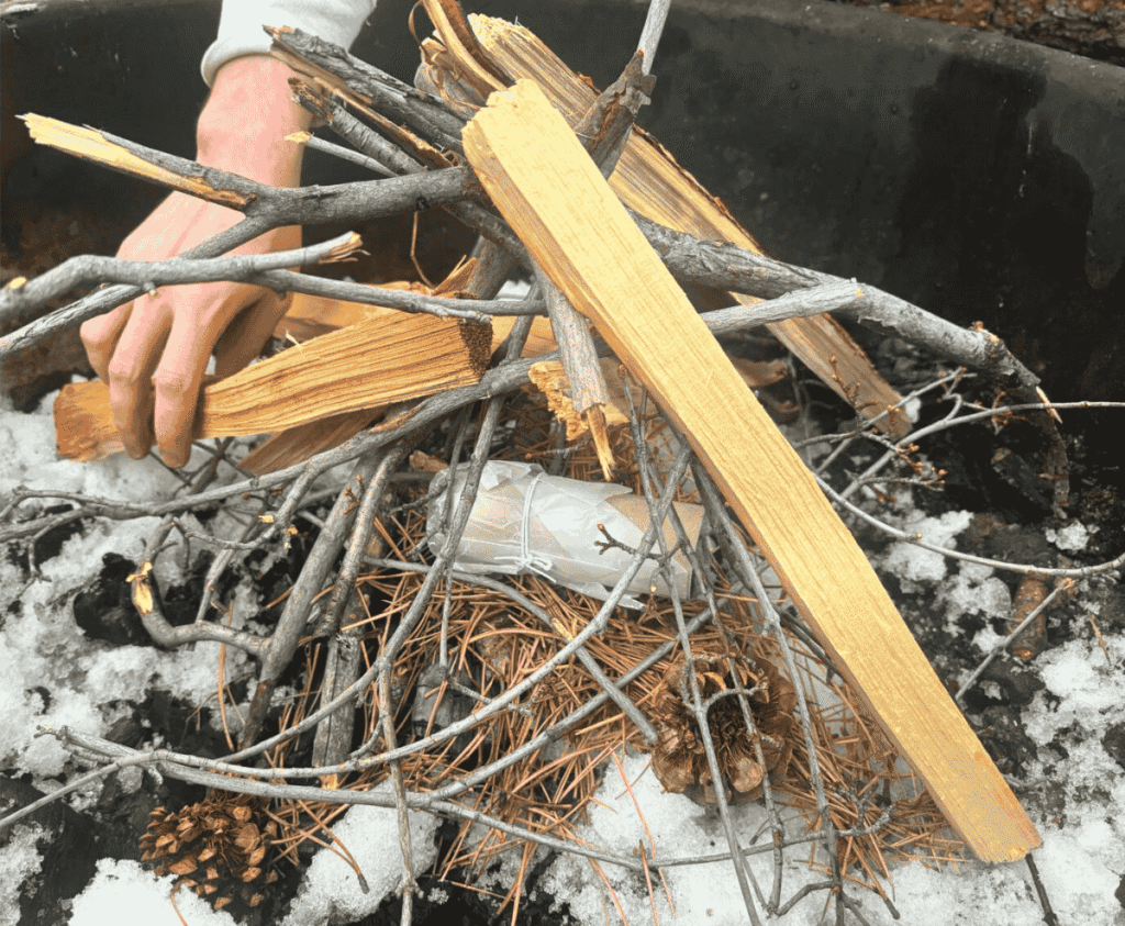 Lint firestarter log in a campfire pit