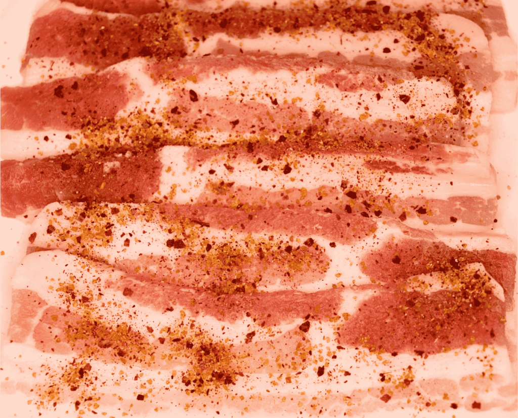 Slices of seasoned bacon