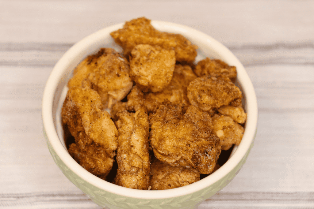 bowl of homemade, golden chicken nuggets