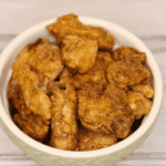 bowl of homemade, golden chicken nuggets