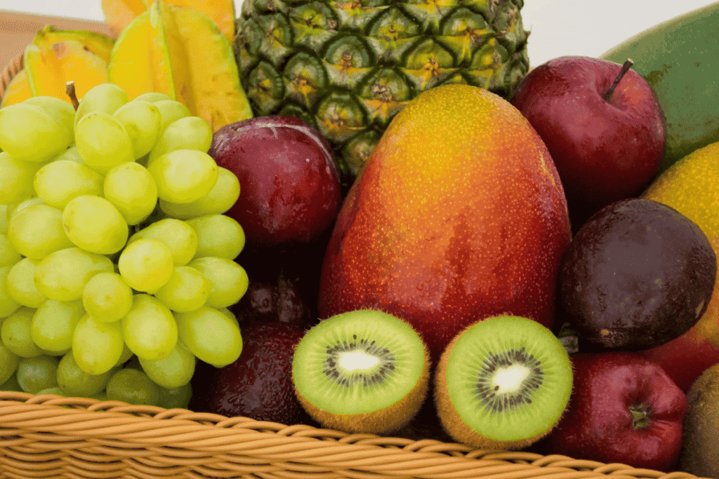 different types of fruit in a wicker basket