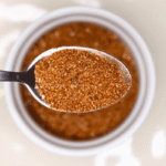 close-up of a spoonful of Cajun seasoning blend