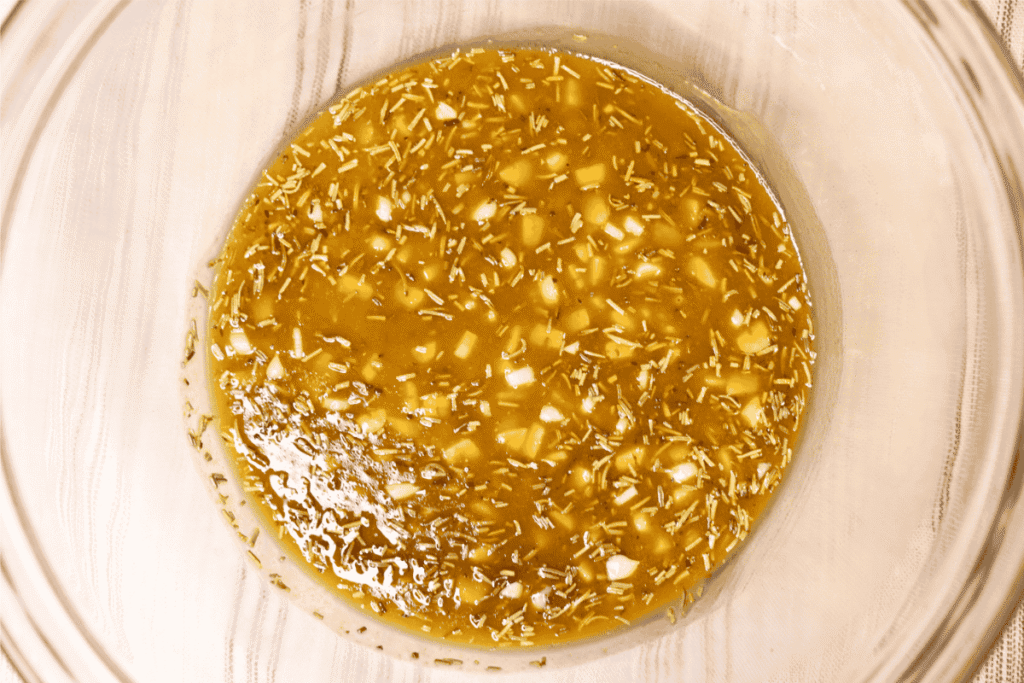 Mixed marinade ingredients in a glass bowl