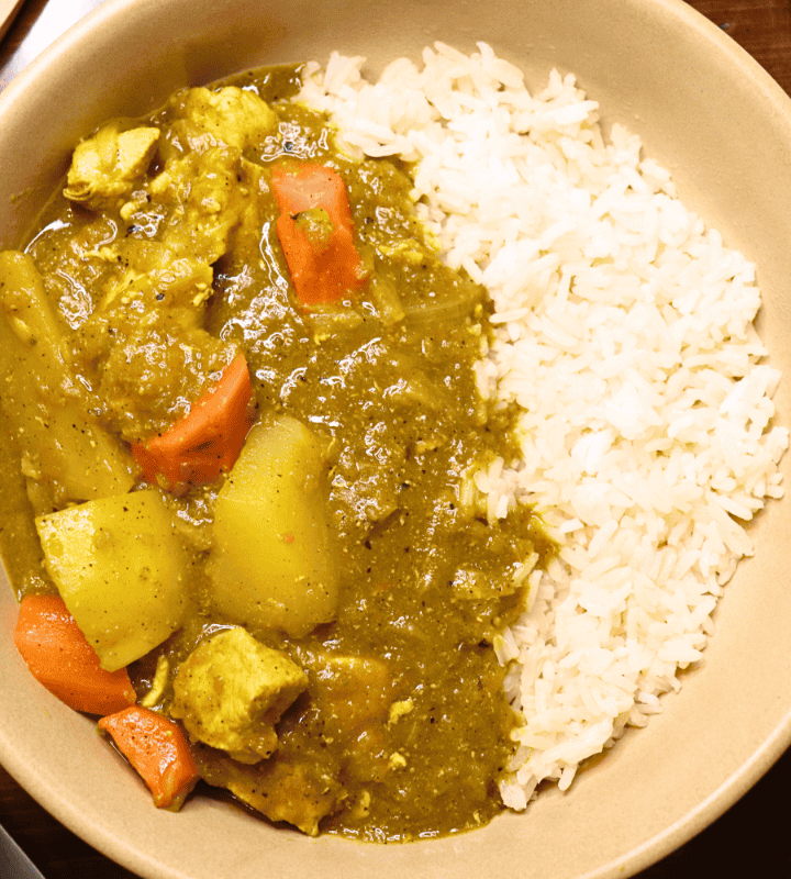 bowl of white rice and Japanese chicken curry
