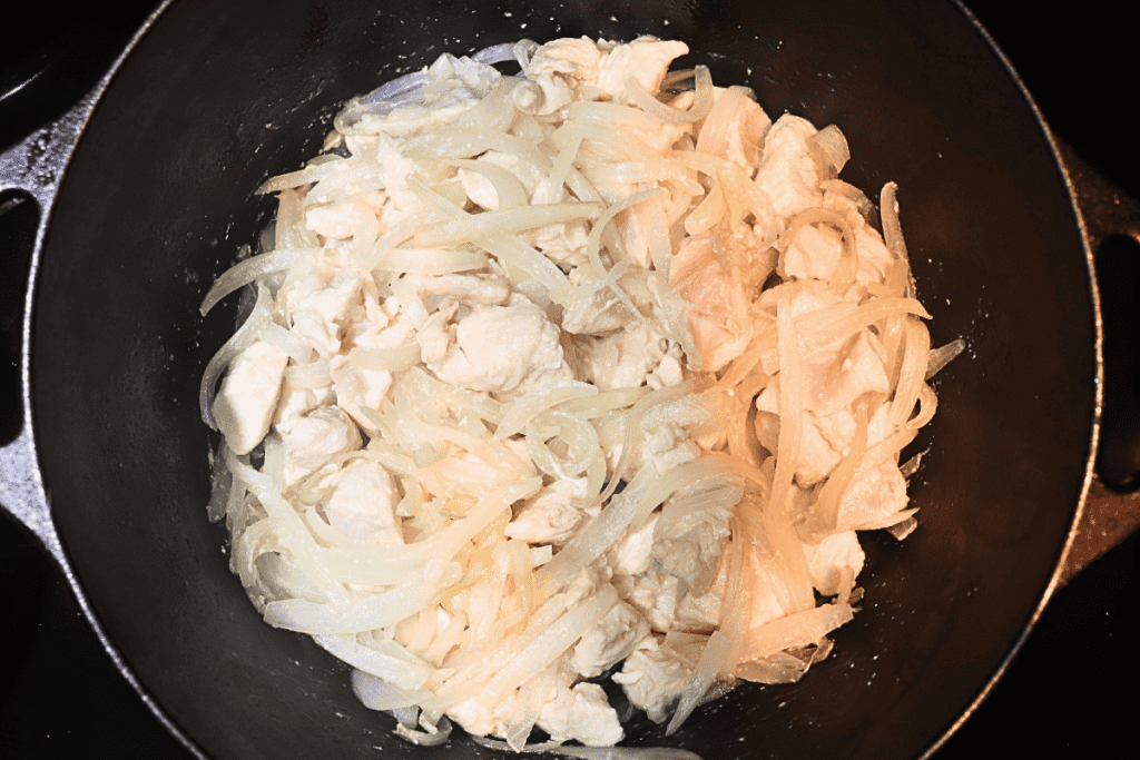 chicken and onions cooking together