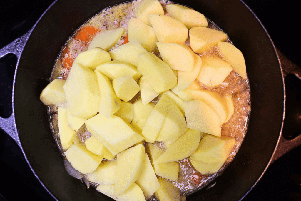 potatoes being added to Japanese curry