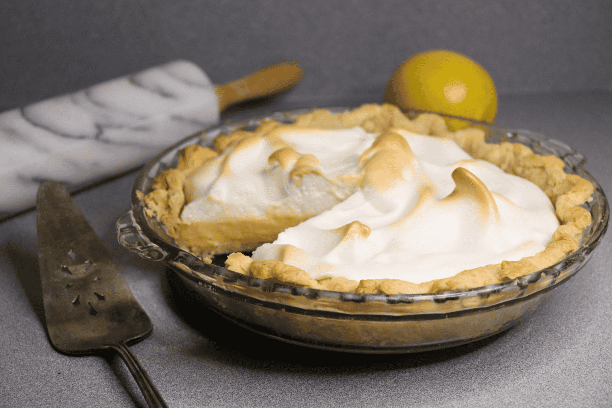 Lemon Meringue Pie with a slice cut out